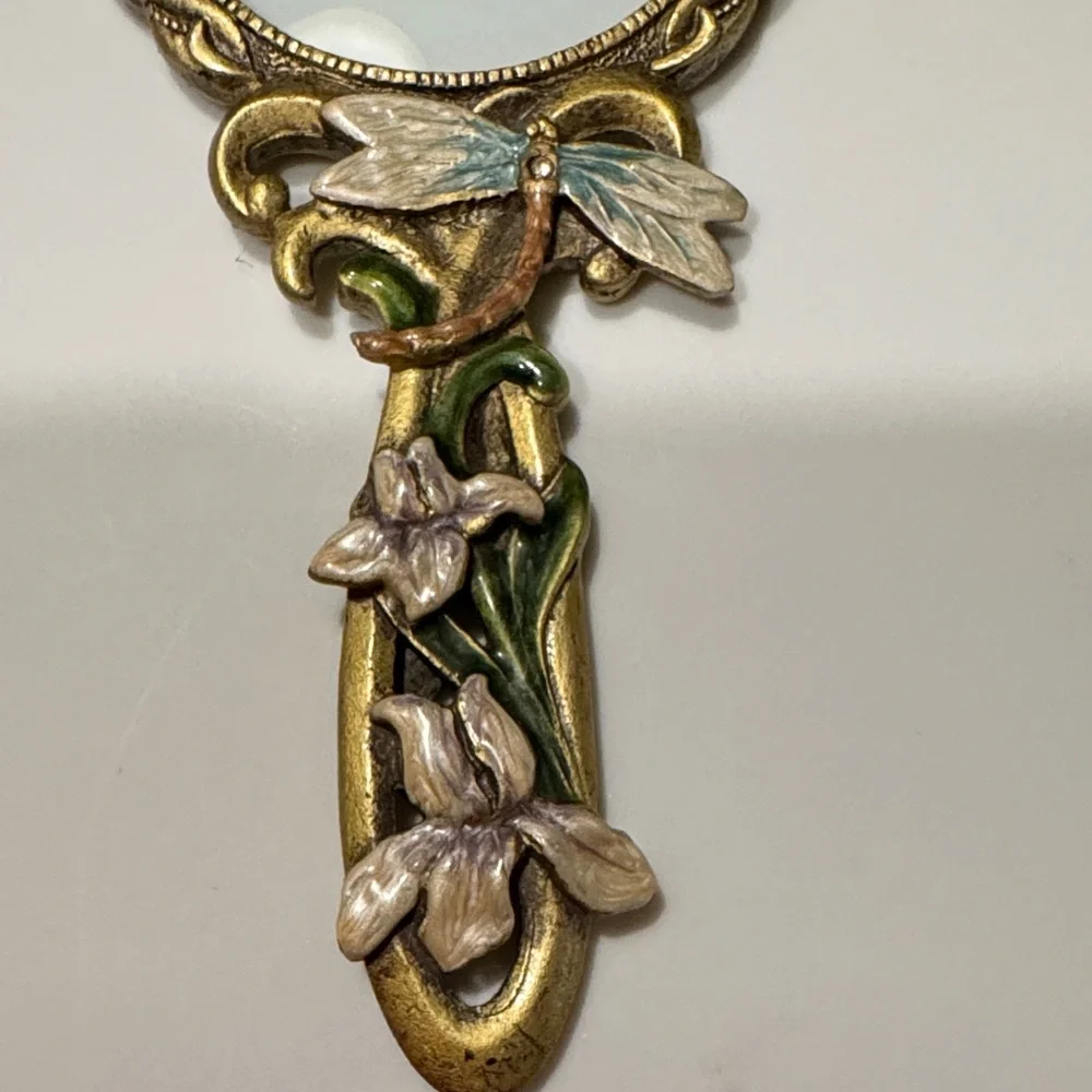 Vintage Handheld Magnifier glass with two intricate Floral Designs